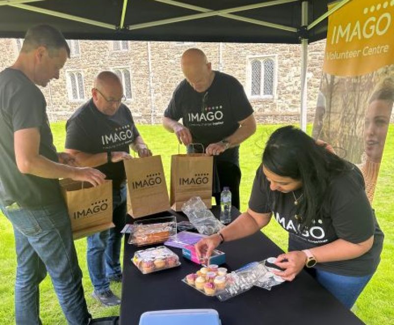 a group of imago volunteers raising awareness
